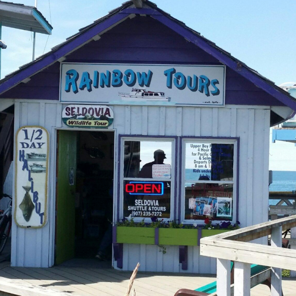 Rainbow Tours store front on the dock
