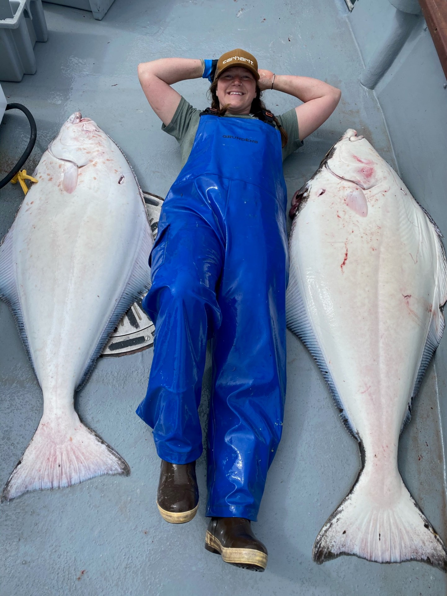 a person holding a fish